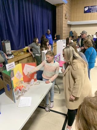 Grades early-K through fifth displayed their projects while offering explanations to visitors and judges. 