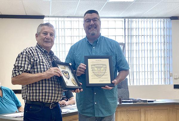 Former Iron River Police Chief Curtis Bristol (right) and Iron River Mayor Dennis Powell (left)