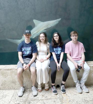 WIC students were able to experience the city of Dallas. Pictured are Spencer Kegley, Riley Porier, Savanah Cole and Ryan Piwarski at the Dallas Aquarium. (submitted photo)