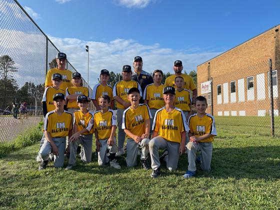Pictured are, bottom row, from left, Weston Fayas, Tommy Husing, Jeb Holsworth, Brolan VanOss, James Powell and Camden Benson. Top row, from left,  Ethan Dennocenzo, Jack Oman, Joe Powell, Mack Anderson, Levi Stapleton and Paxton Anderson.  Coaches are the back row.