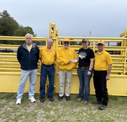 Iron County Golden K receiving check from the U.P. Rodeo. Pictured are, from left, Dave Koski, Ray Spencer, Brian Kassa, Ashley Burke (U.P. Rodeo Co-Chair and Secretary) and Terry Spitza.