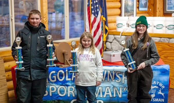 Pictured are, from left, the youth’s first place winners,  Jason Harwath first place in both Bluegill and Crappie, Abigail Quinnell in Northern Pike and Macy Trulock in Perch.