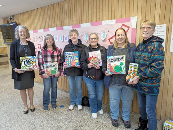 Stambaugh Legion Auxiliary Reino Unit 21 made a donation of games to WIC Stambaugh Elementary on Monday, Feb. 19 for indoor recess. Pictured are, from left, Heidi Priestley (Elementary Principal), Kathy Svenson (Auxiliary Secretary), Linda Johnson (V Vice President), Susie Fitzpatrick (Auxiliary Chaplain), Cella Thurston (Auxiliary Exec. Comm.) and Linda Nasser (President). (Submitted photo.)