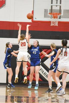 Forest Park sophomore, Ava Fischer #20 jumping at her chance to bring in some points for her team.